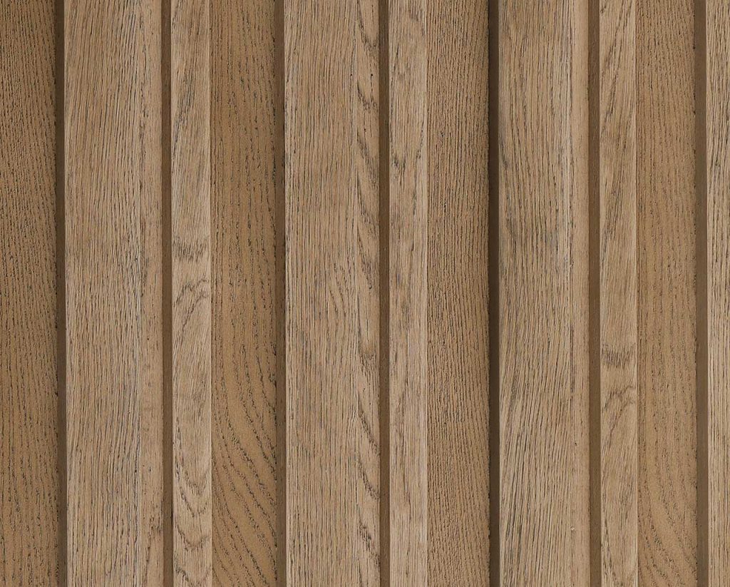 Textured golden oak wood paneling with vertical grooves