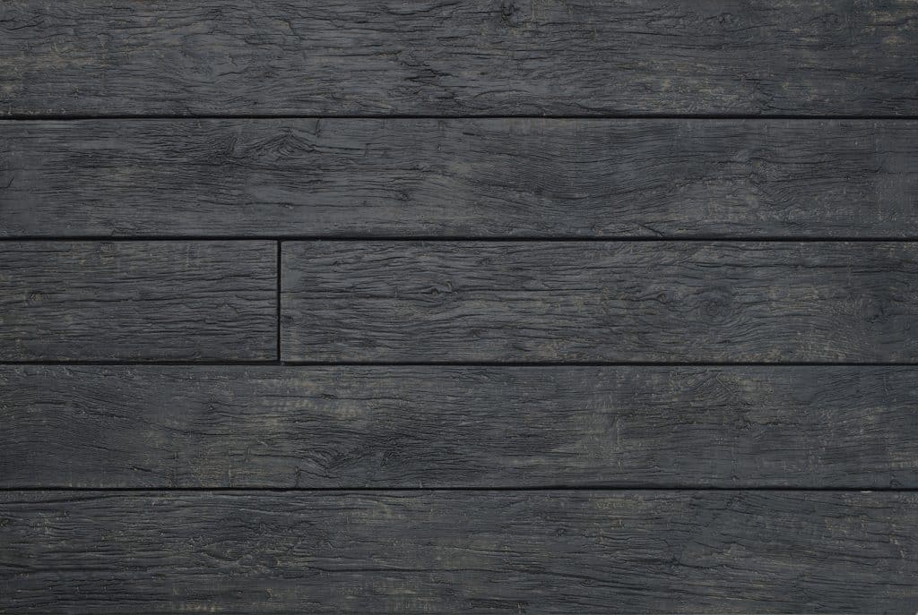 Dark, weathered wooden planks, perfect for a rustic design.