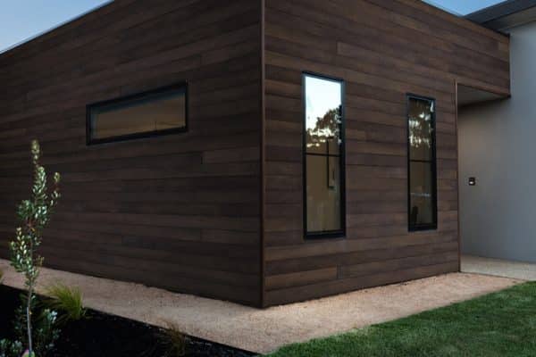 Enhance Your Home's Appeal With Wall Cladding Solutions 3 Concept Materials Composite Decking Modern home exterior with dark wood wall cladding solutions and stylish windows