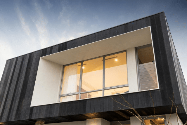 A modern house that features low-maintenance cladding that save time, boost efficiency.