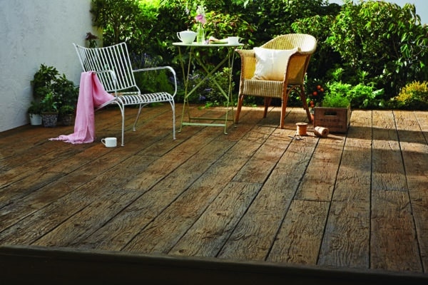 Millboard decking installation highlighting weathered oak vintage.