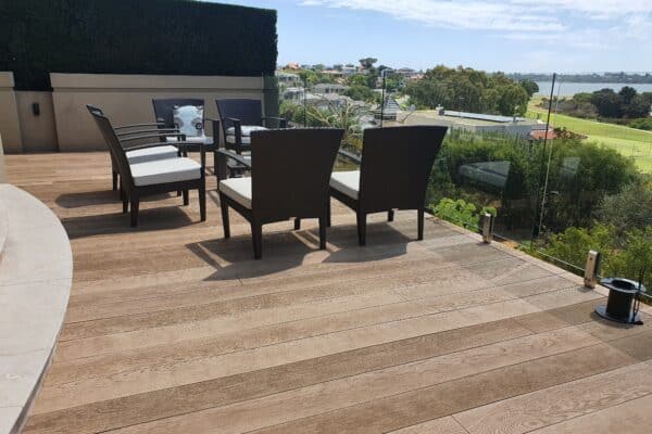 Luxury outdoor space with deck, seating, and a beautiful view.