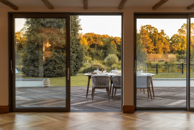 Millboard decking Australia in a modern home dining area.